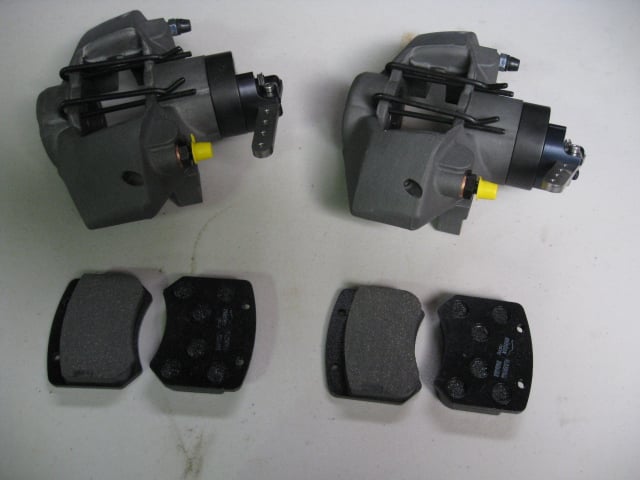 PAIR OF AP CP2577 REAR BRAKE CALIPERS AND PADS